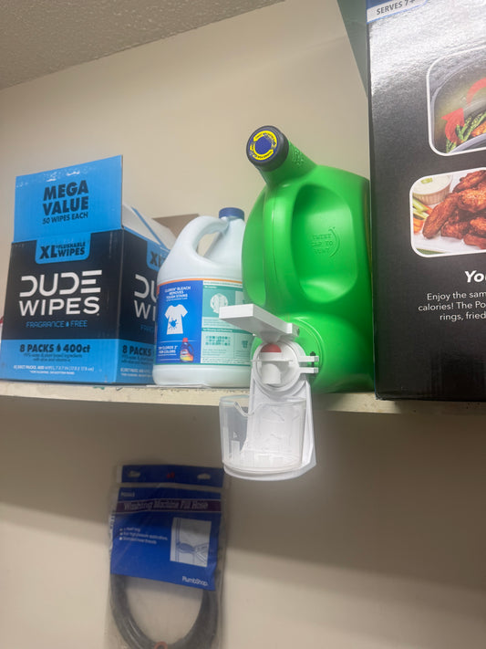 Laundry soap dispenser with cup holder